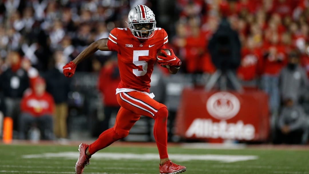 Ohio State receiver Garrett Wilson plays against Penn State during an NCAA college football game Saturday, Oct. 30, 2021, in Columbus, Ohio. (AP Photo/Jay LaPrete)