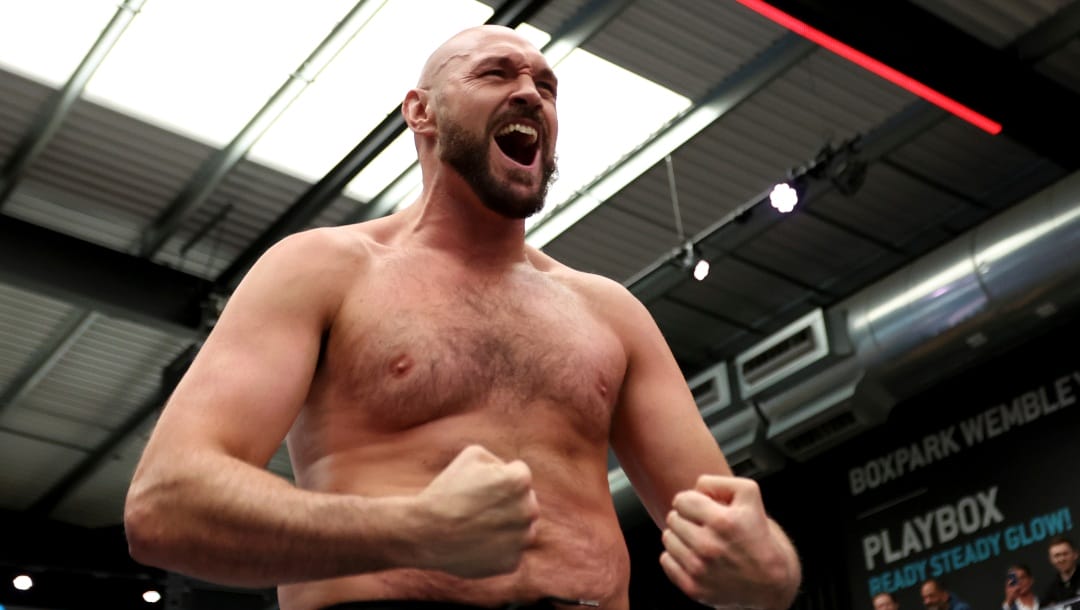 British boxer Tyson Fury attends an open workout for the media and fans at Wembley's Boxpark in London, Tuesday, April 19, 2022. Fury will defend his WBC heavyweight title against Dillian Whyte at Wembley Stadium Saturday.