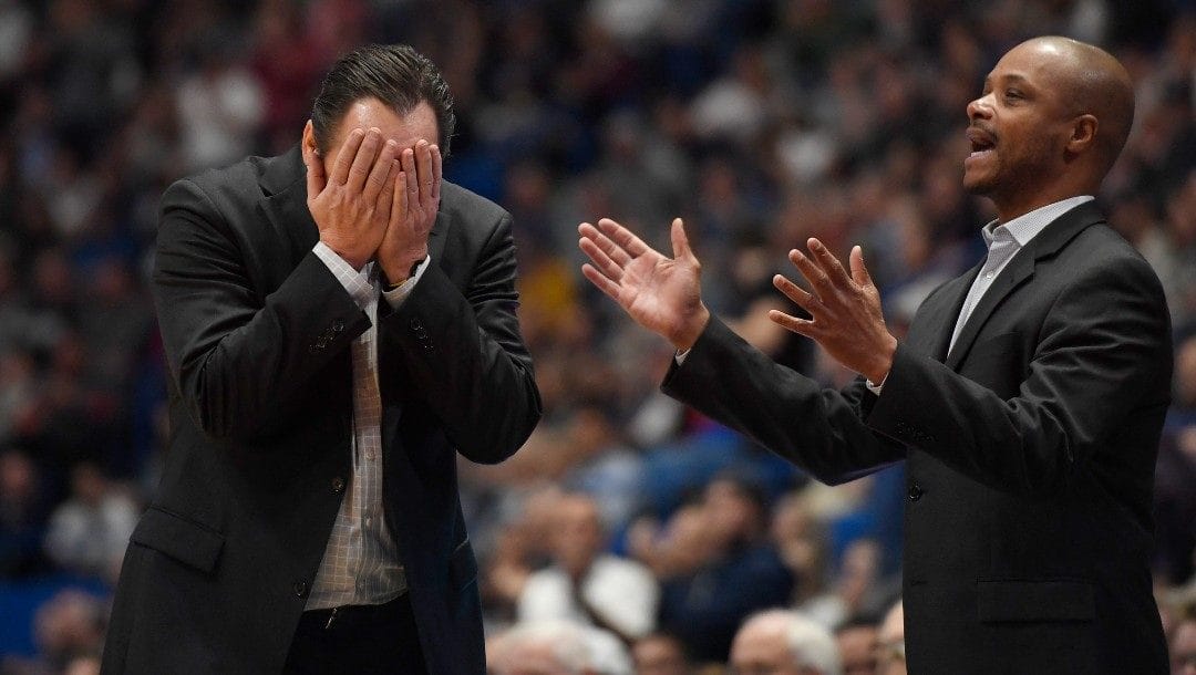 Wichita State head coach Gregg Marshall, left, and assistant coach Isaac Brown are shown during the second half of an NCAA college basketball game in Hartford, Conn., Sunday, Jan. 12, 2020.