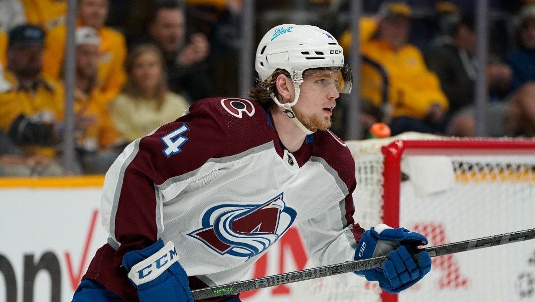 Colorado Avalanche defenseman Bowen Byram (4) plays against the Nashville Predators during the second period in Game 4 of an NHL hockey first-round playoff series Monday, May 9, 2022, in Nashville, Tenn.