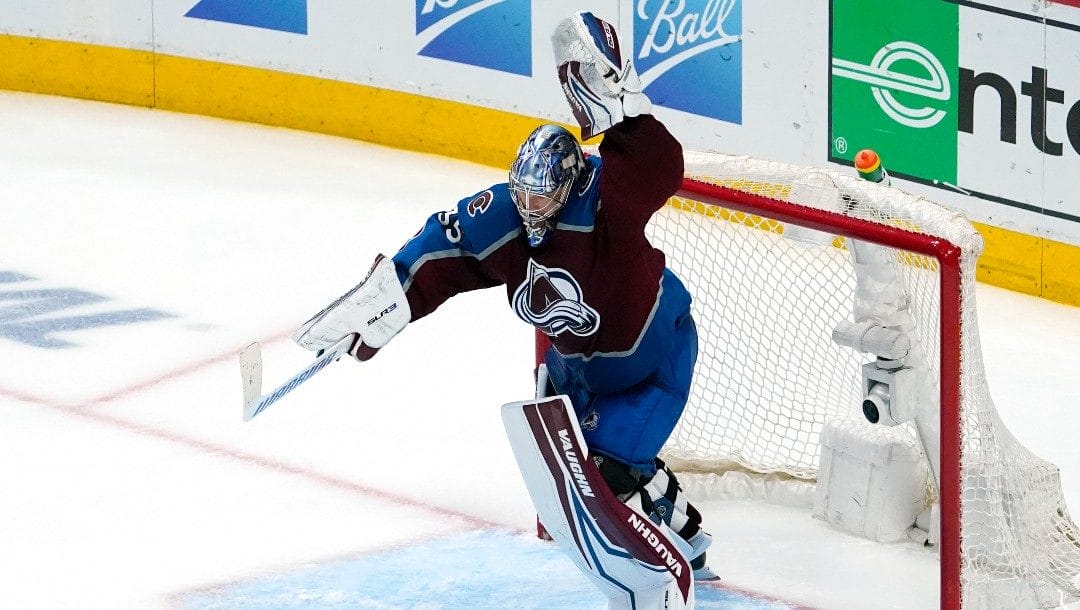 Colorado Avalanche goaltender Darcy Kuemper celebrates the team's 2-1 overtime win against the Nashville Predators in Game 2 of an NHL hockey Stanley Cup first-round playoff series Thursday, May 5, 2022, in Denver.