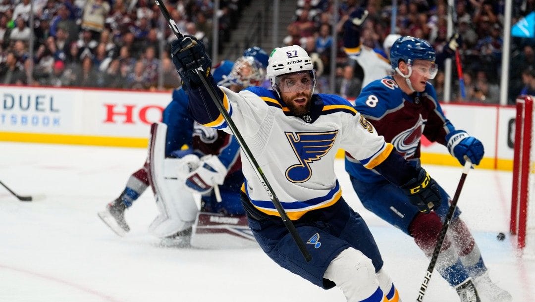 St. Louis Blues left wing David Perron (57) celebrates his goal against the Colorado Avalanche during the third period in Game 2 of an NHL hockey Stanley Cup second-round playoff series Thursday, May 19, 2022, in Denver.
