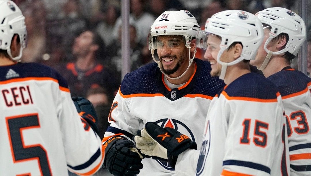 Edmonton Oilers left wing Evander Kane, second from left, celebrates his goal with defenseman Cody Ceci, left, right wing Josh Archibald, second from right, and center Ryan Nugent-Hopkins during the third period in Game 3 of an NHL hockey Stanley Cup first-round playoff series against the Los Angeles Kings Friday, May 6, 2022, in Los Angeles.