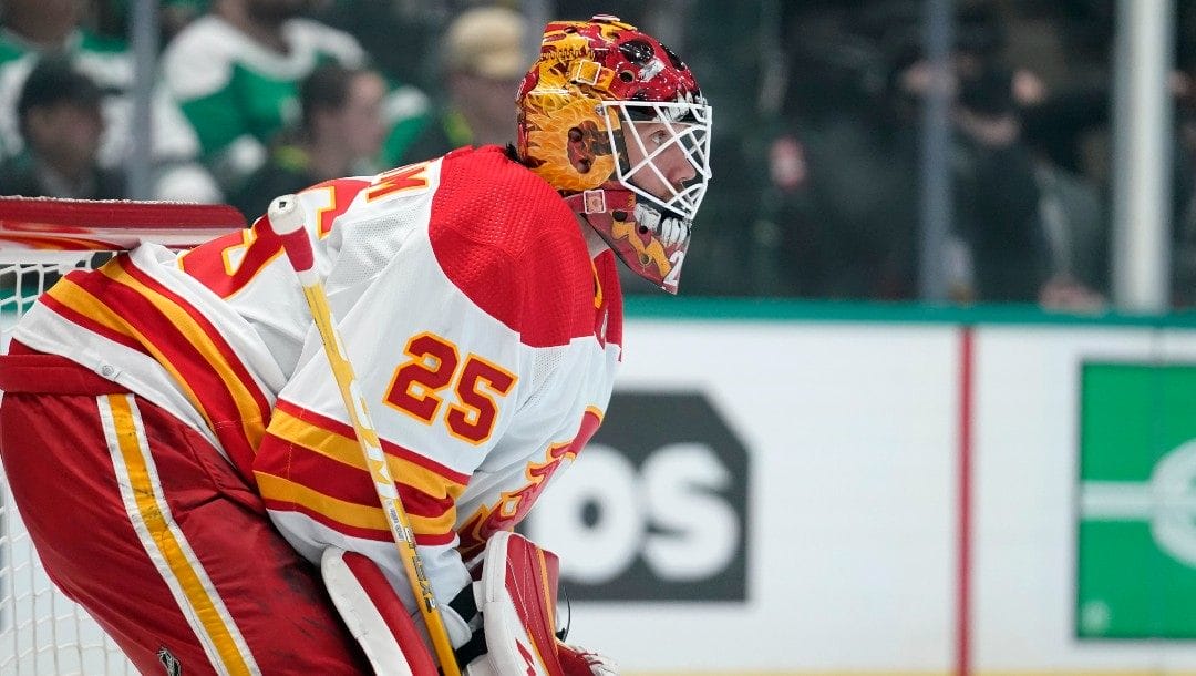 Calgary Flames goaltender Jacob Markstrom watches play against the Dallas Stars during Game 4 of an NHL hockey Stanley Cup first-round playoff series, Tuesday, May 10, 2022, in Dallas.