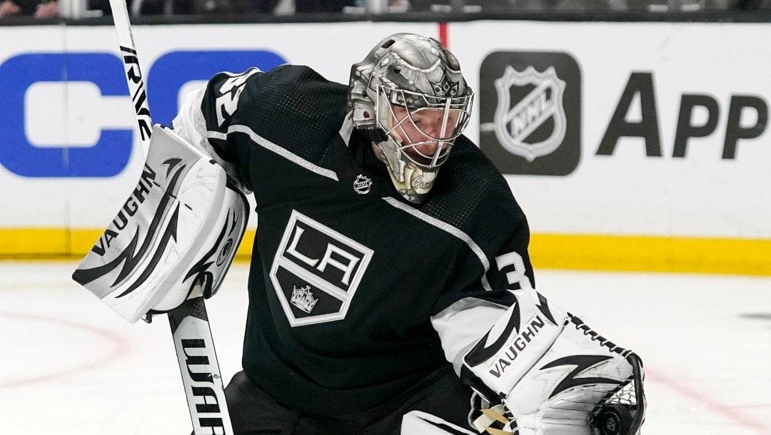 Los Angeles Kings goaltender Jonathan Quick makes a glove save during the third period in Game 4 of an NHL hockey Stanley Cup first-round playoff series against the Edmonton Oilers Sunday, May 8, 2022, in Los Angeles.