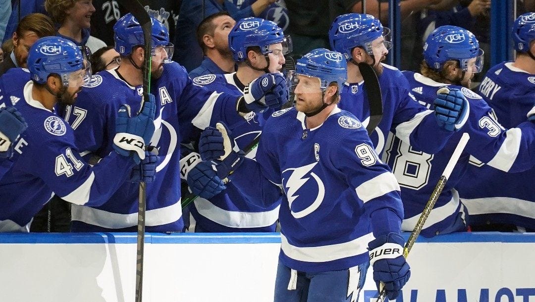 Tampa Bay Lightning center Steven Stamkos (91) celebrates with the bench after scoring against the Toronto Maple Leafs during the first period in Game 4 of an NHL hockey first-round playoff series Sunday, May 8, 2022, in Tampa, Fla.