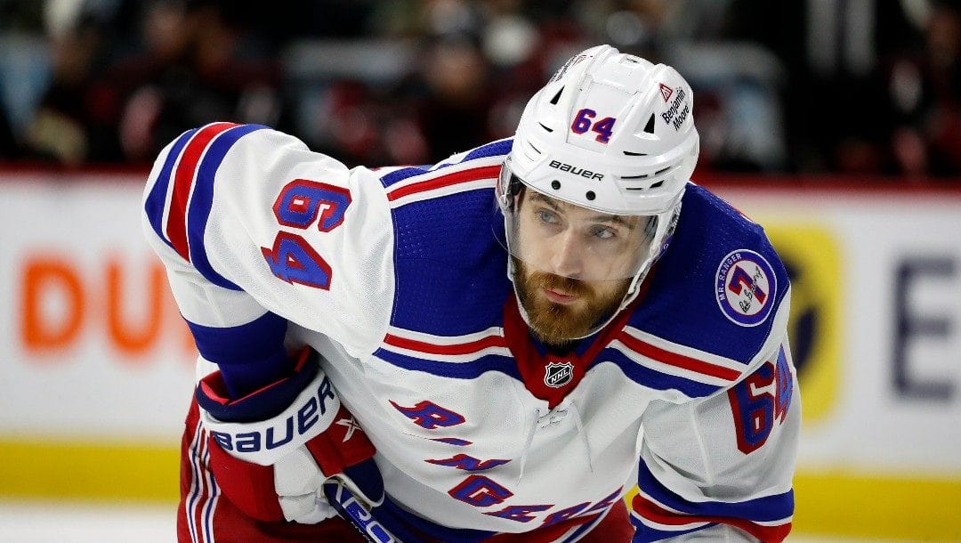 New York Rangers' Tyler Motte (64) waits for a face-off against the Carolina Hurricanes during the third period of Game 2 of an NHL hockey Stanley Cup second-round playoff series in Raleigh, N.C., Friday, May 20, 2022.