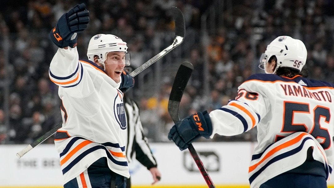 Edmonton Oilers defenseman Tyson Barrie, left, celebrates his goal with right wing Kailer Yamamoto during the third period in Game 6 of an NHL hockey Stanley Cup first-round playoff series against the Los Angeles Kings Thursday, May 12, 2022, in Los Angeles.