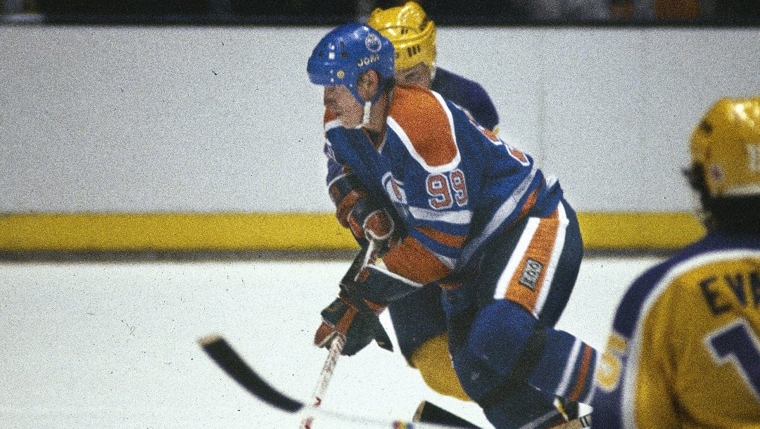 Edmonton Oilers' center forward Wayne Gretzky (99) is seen in action against the Los Angeles Kings, 1982. (AP Photo)