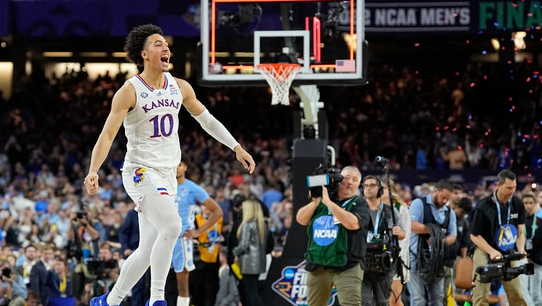 Kansas forward Jalen Wilson celebrates after their win against North Carolina in a college basketball game in the finals of the Men's Final Four NCAA tournament, Monday, April 4, 2022, in New Orleans. (AP Photo/David J. Phillip)