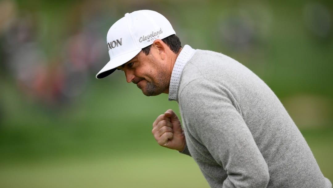 Keegan Bradley reacts after making a putt on the 16th hole during the final round of the Wells Fargo Championship golf tournament, Sunday, May 8, 2022, at TPC Potomac at Avenel Farm golf club in Potomac, Md. (AP Photo/Nick Wass)