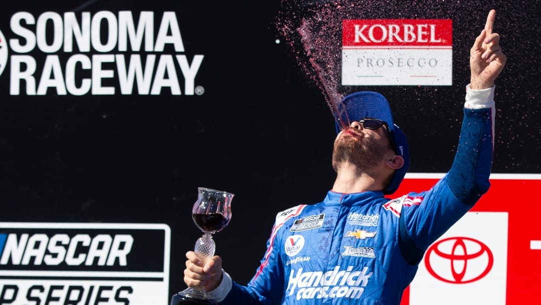 Kyle Larson celebrates his victory in a NASCAR Cup Series auto race, Sunday, June 6, 2021, at Sonoma Raceway in Sonoma, Calif. (AP Photo/D. Ross Cameron)