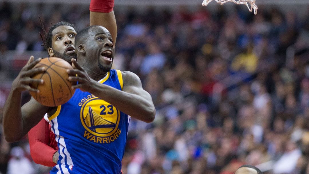 Draymond Green drives to the basket in a recent game.