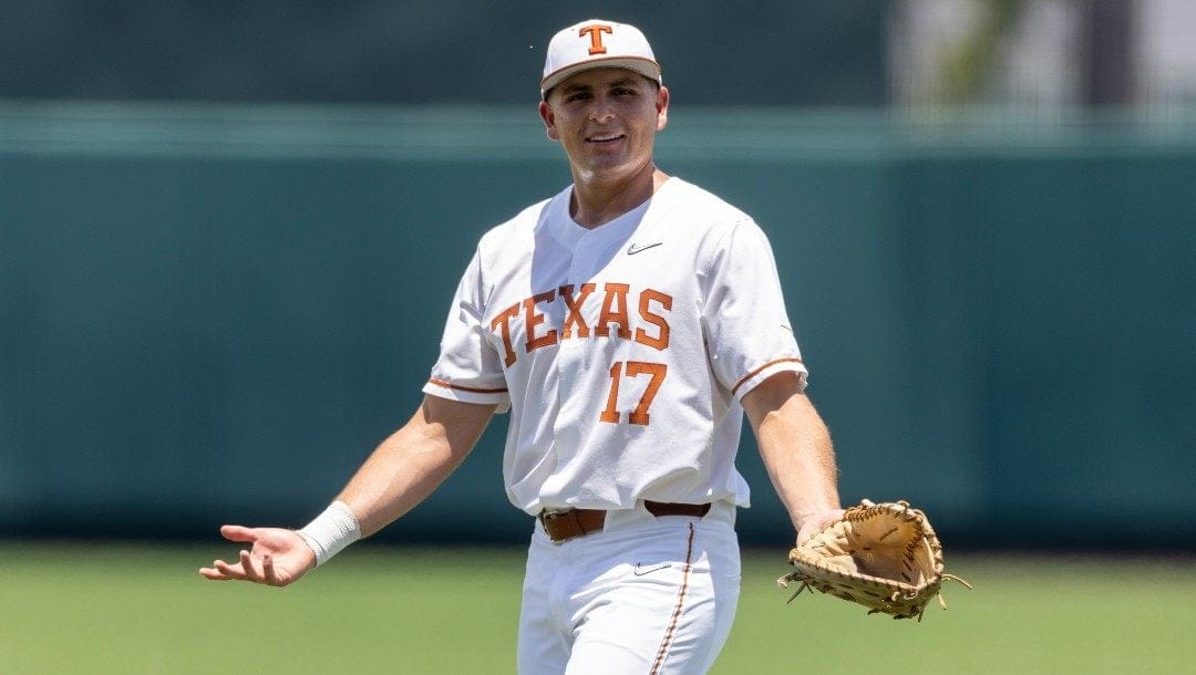 Texas infielder Ivan Melendez (17) speaks to the dugout as he takes the field against Air Force during an NCAA baseball game on Friday, June 3, 2022, in Austin, Texas.