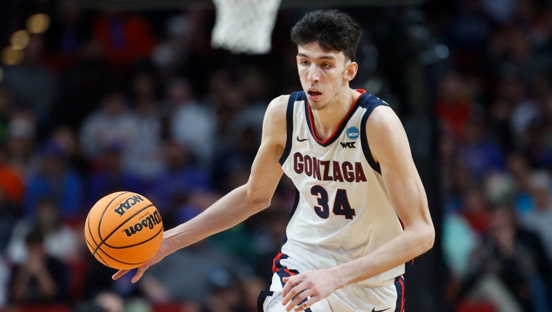 Gonzaga center Chet Holmgren (34) moves the ball against Georgia State during the second half of a first round NCAA college basketball tournament game, Thursday, March 17, 2022, in Portland, Ore.