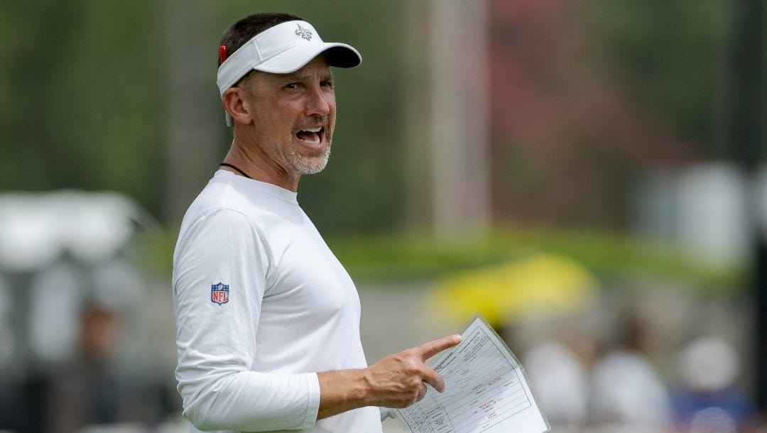 New Orleans Saints head coach Dennis Allen calls out to his players during an NFL football practice in Metairie, La., Wednesday, June 15, 2022.