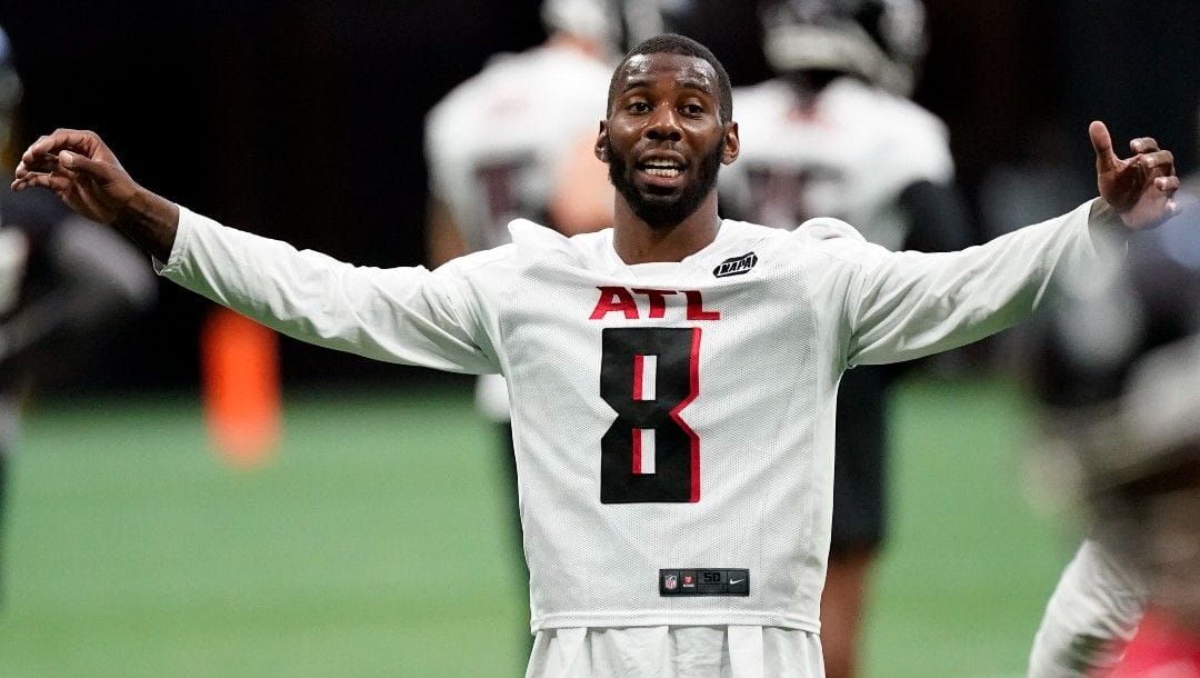 Atlanta Falcons tight end Kyle Pitts gestures as he speaks during a voluntary offseason NFL football practice Friday, June 3, 2022, in Atlanta.