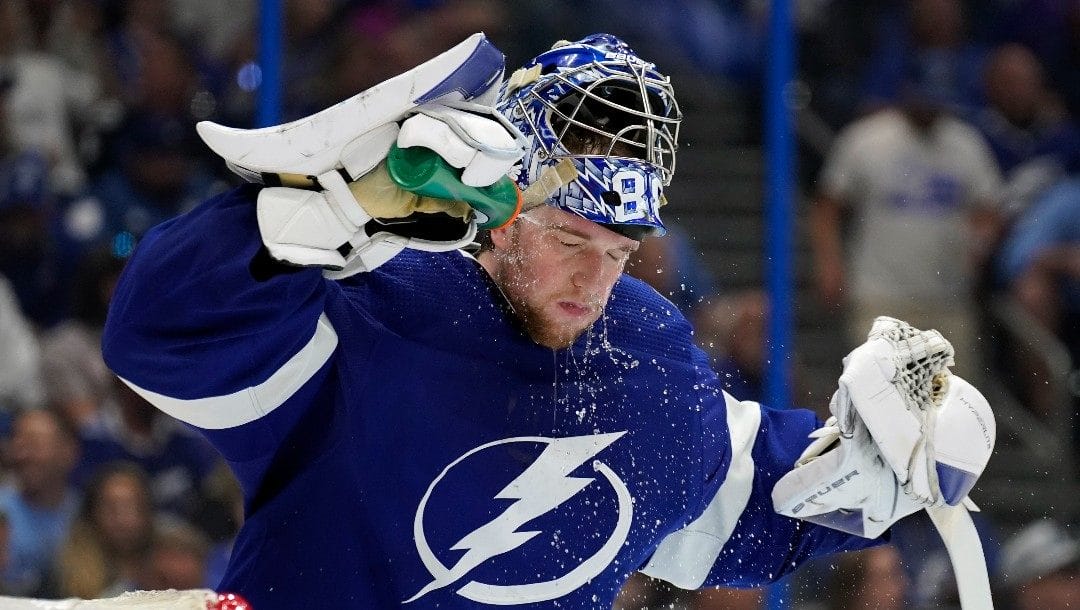 Tampa Bay Lightning goaltender Andrei Vasilevskiy (88) sprays water on his face during a timeout against the Florida Panthers during the third period in Game 4 of an NHL hockey second-round playoff series Monday, May 23, 2022, in Tampa, Fla.