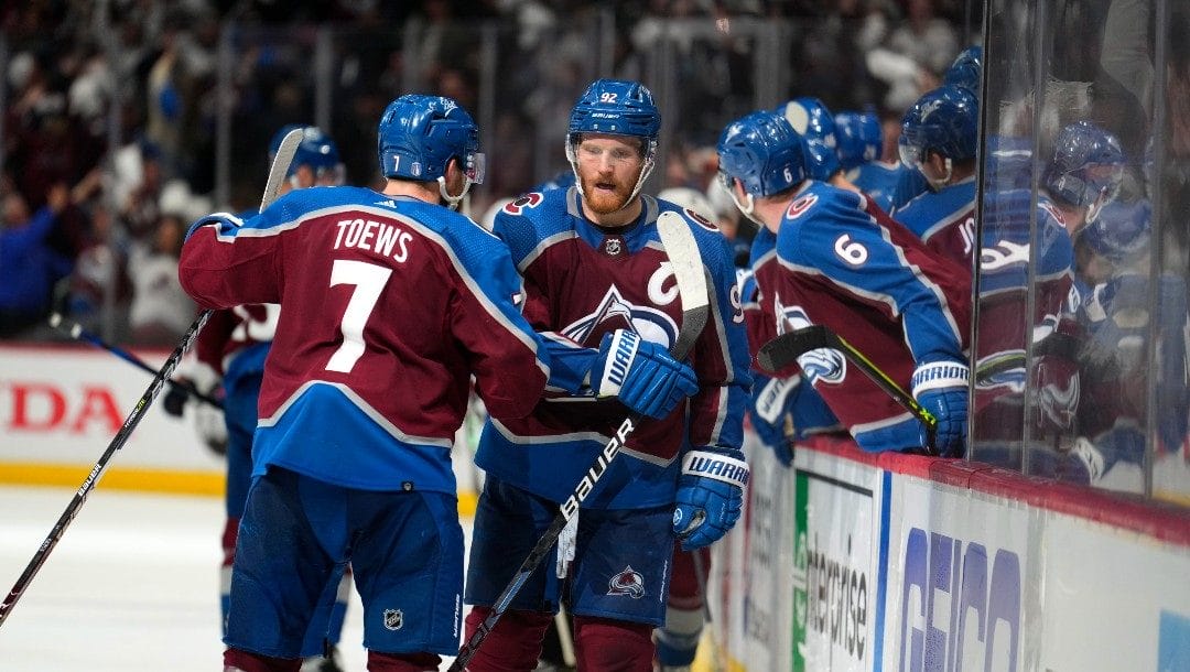 Colorado Avalanche left wing Gabriel Landeskog (92) celebrates an empty-net goal against the Edmonton Oilers during the third period in Game 1 of the NHL hockey Stanley Cup playoffs Western Conference finals Tuesday, May 31, 2022, in Denver.