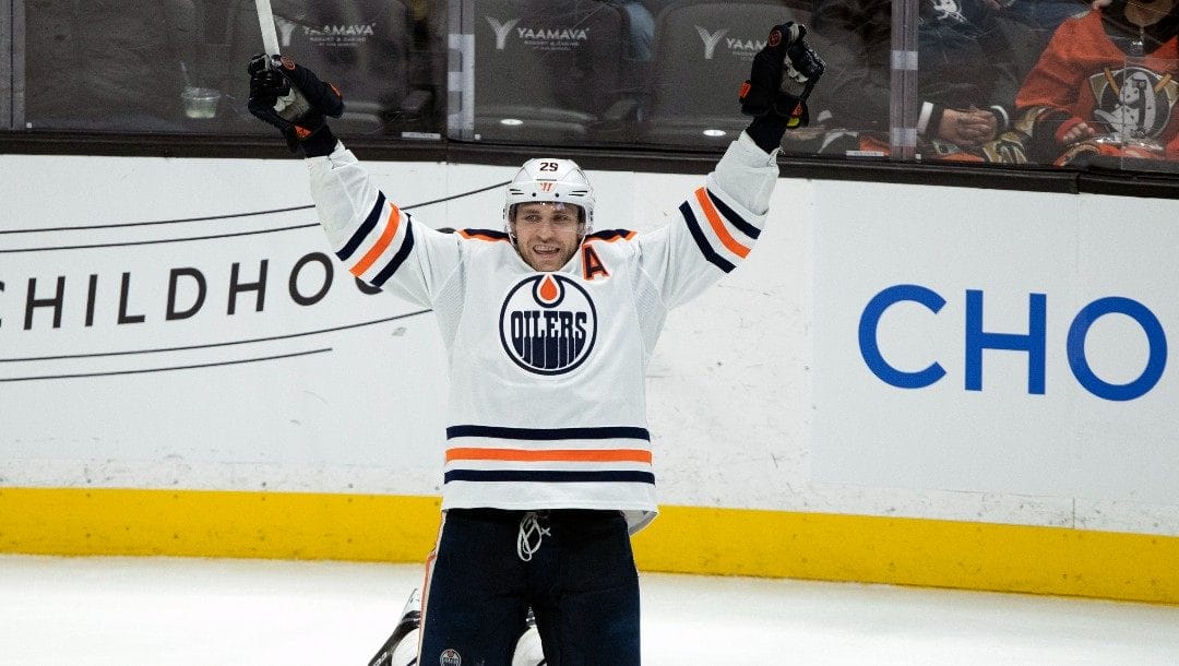 Edmonton Oilers center Leon Draisaitl reacts after scoring against the Anaheim Ducks during the third period of an NHL hockey game in Anaheim, Calif., Sunday, April 3, 2022.