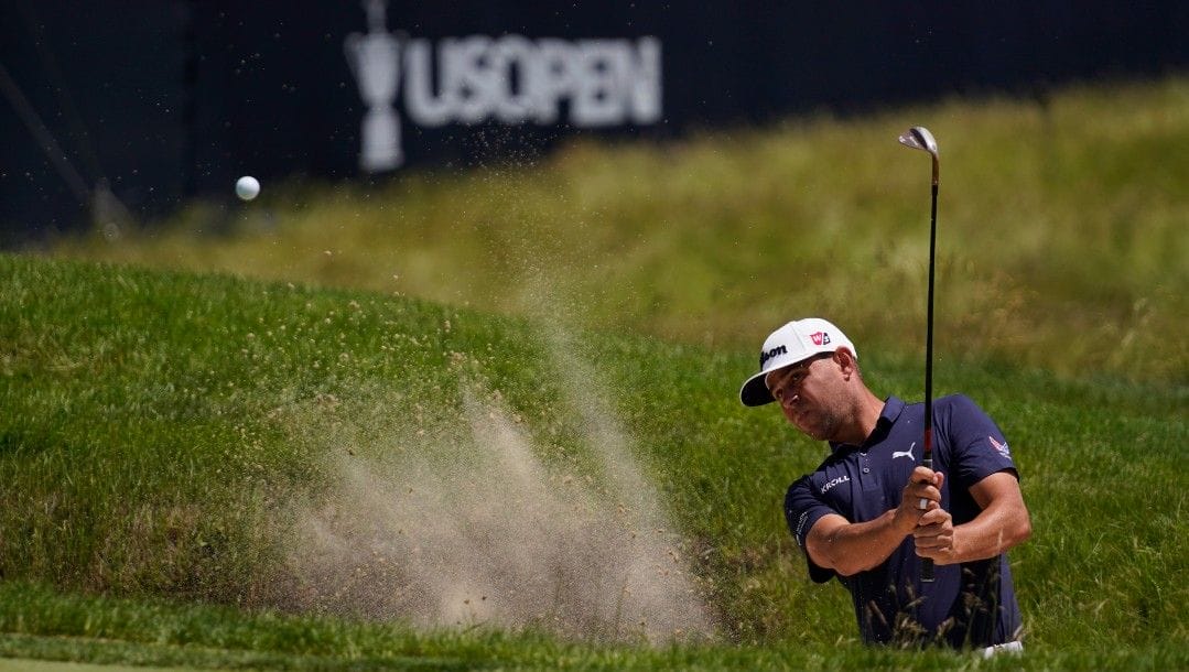 Gary Woodland hits out of a bunker on the second hole during a practice round for the U.S. Open golf tournament at The Country Club, Wednesday, June 15, 2022, in Brookline, Mass.