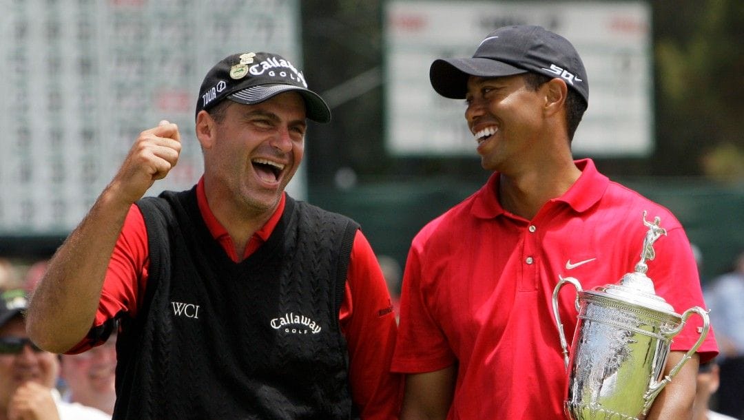 In this June 16, 2008, file photo, Rocco Mediate. left, jokes with Tiger Woods following Woods' U.S. Open championship victory after playing a sudden death hole following an 18-hole playoff round for the US Open championship at Torrey Pines Golf Course in San Diego.