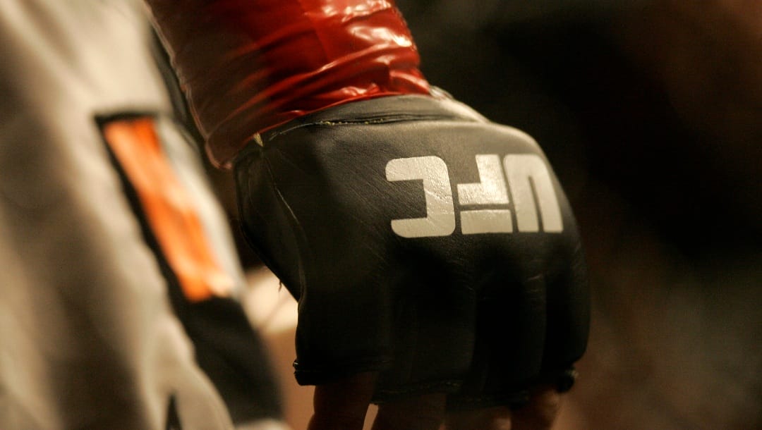 Closeup of a glove and the UFC logo at Ultimate Fighting Championship 73 on Saturday, July 7, 2007, in Sacramento, Calif.