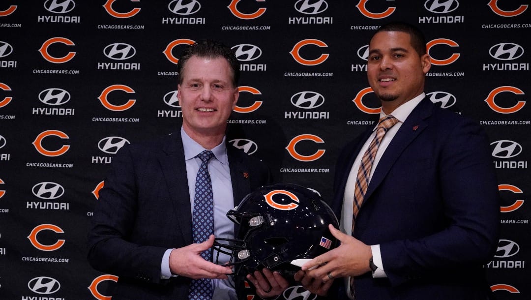 Chicago Bears new head coach Matt Eberflus, left, and new general manager Ryan Poles pose for photo during a news conference at Halas Hall in Lake Forest, Ill., Monday, Jan. 31, 2022.