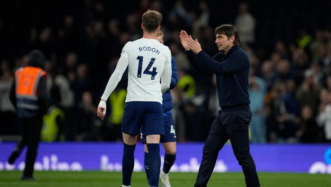 Tottenham's head coach Antonio Conte applauds after the end of the English Premier League soccer match between Tottenham Hotspur and Arsenal at Tottenham Hotspur stadium in London, England, Thursday, May 12, 2022. Tottenham won the game 3-0.