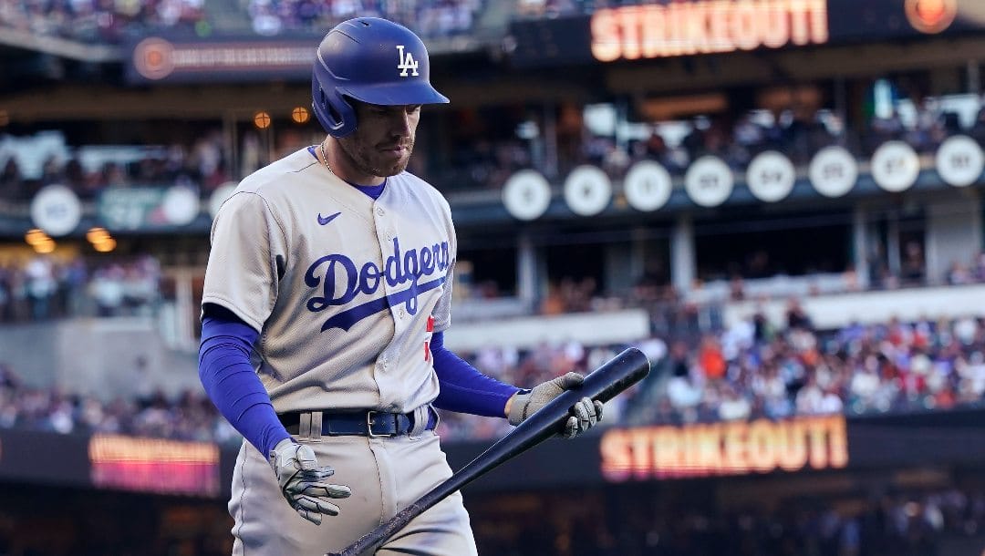 Los Angeles Dodgers' Freddie Freeman walks to the dugout after striking out against the San Francisco Giants during the seventh inning of a baseball game in San Francisco, Saturday, June 11, 2022.