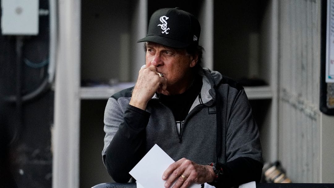 Chicago White Sox manager Tony La Russa looks to the field from the dugout before the team's baseball game against the Texas Rangers in Chicago, Friday, June 10, 2022.