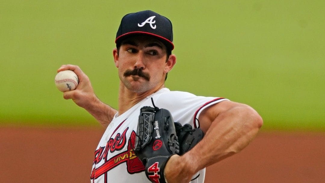 Atlanta Braves starting pitcher Spencer Strider (65) delivers in the first inning of a baseball game against the New York Mets Tuesday, July 12, 2022, in Atlanta.