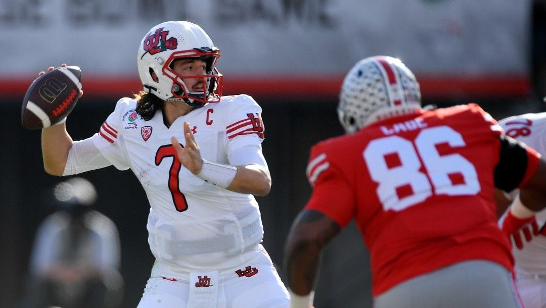 Utah quarterback Cameron Rising looks to throw during the first half in the Rose Bowl NCAA college football game against Ohio State Saturday, Jan. 1, 2022, in Pasadena, Calif.