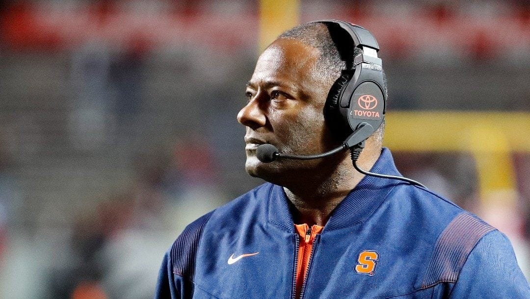 Syracuse head coach Dino Babers watches from the sideline during the second half of an NCAA college football game against North Carolina State in Raleigh, N.C., Saturday, Nov. 20, 2021.