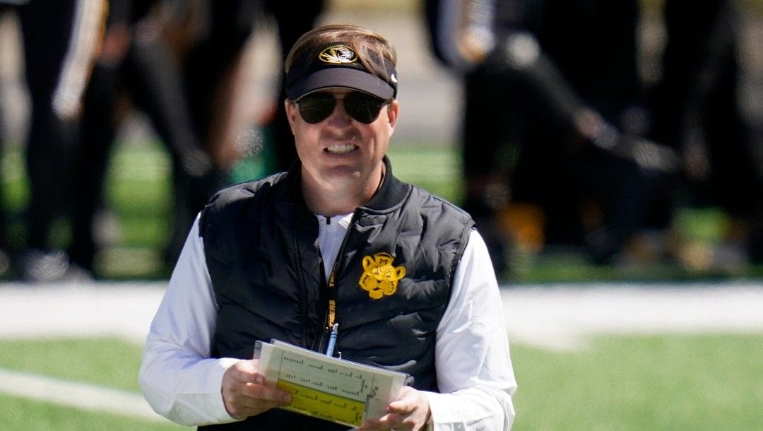 Missouri head coach Eliah Drinkwitz watches his team during an NCAA college football intra-squad spring game Saturday, March 19, 2022, in Columbia, Mo.
