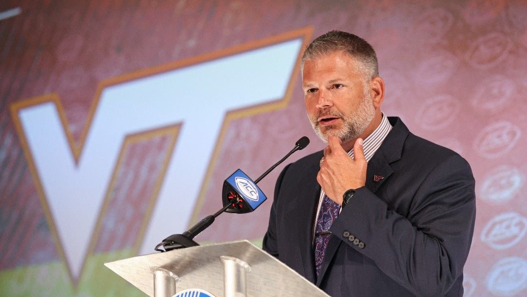 Virginia Tech head coach Justin Fuente answers a question during an NCAA college football news conference at the Atlantic Coast Conference media days in Charlotte, N.C., Wednesday, July 21, 2021.