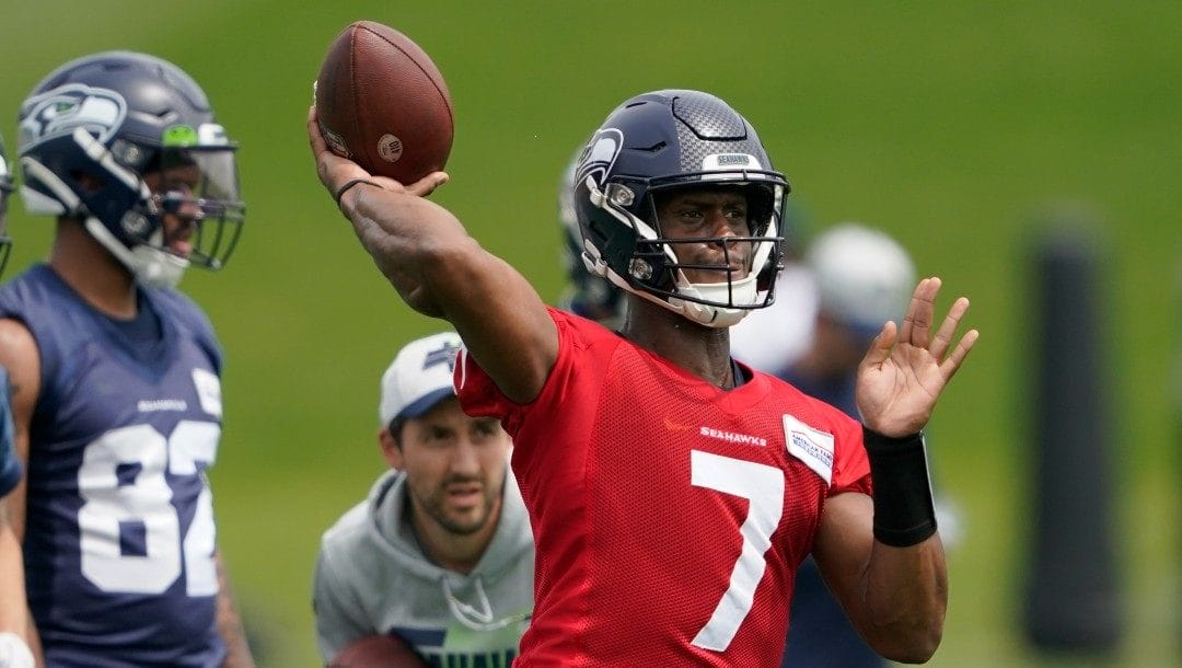 Seattle Seahawks quarterback Geno Smith passes during NFL football practice Wednesday, June 8, 2022, in Renton, Wash.