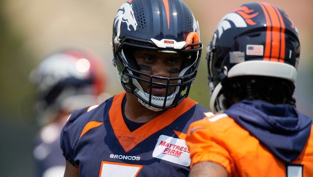 Denver Broncos quarterback Russell Wilson (3) takes part in drills during the NFL team's practice at the Broncos' headquarters Monday, June 13, 2022, in Centennial, Colo.
