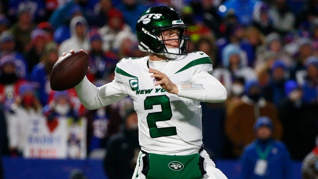 New York Jets quarterback Zach Wilson (2) throws a pass during the first half of an NFL football game against the Buffalo Bills in Orchard park, N.Y., Sunday Jan. 9, 2022.