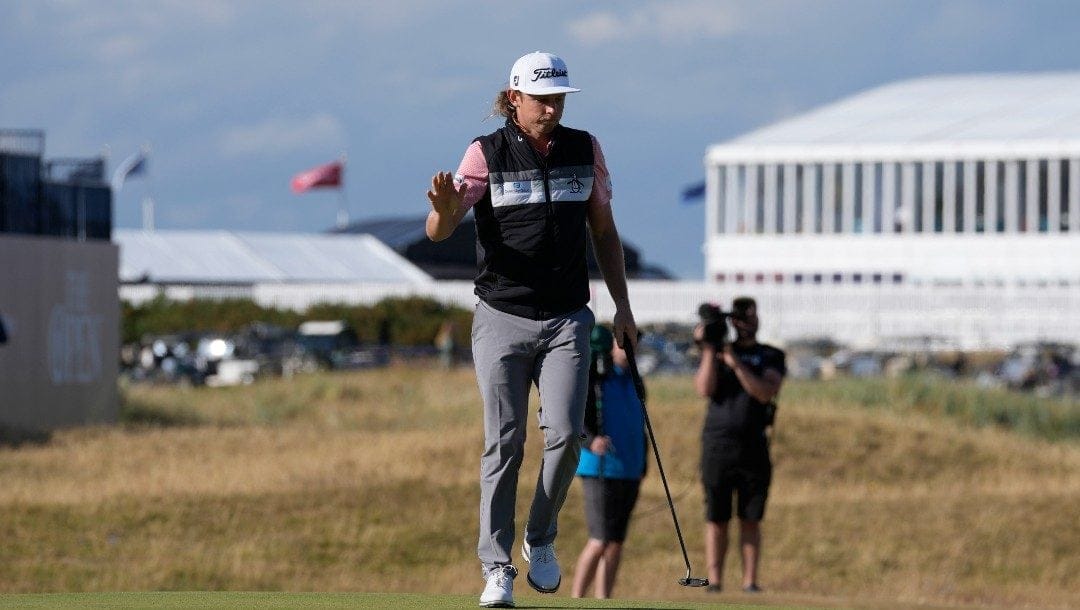Cameron Smith, of Australia, acknowledges the crowd after putting on the 17th hole during the second round of the British Open golf championship on the Old Course at St. Andrews, Scotland, Friday July 15, 2022.