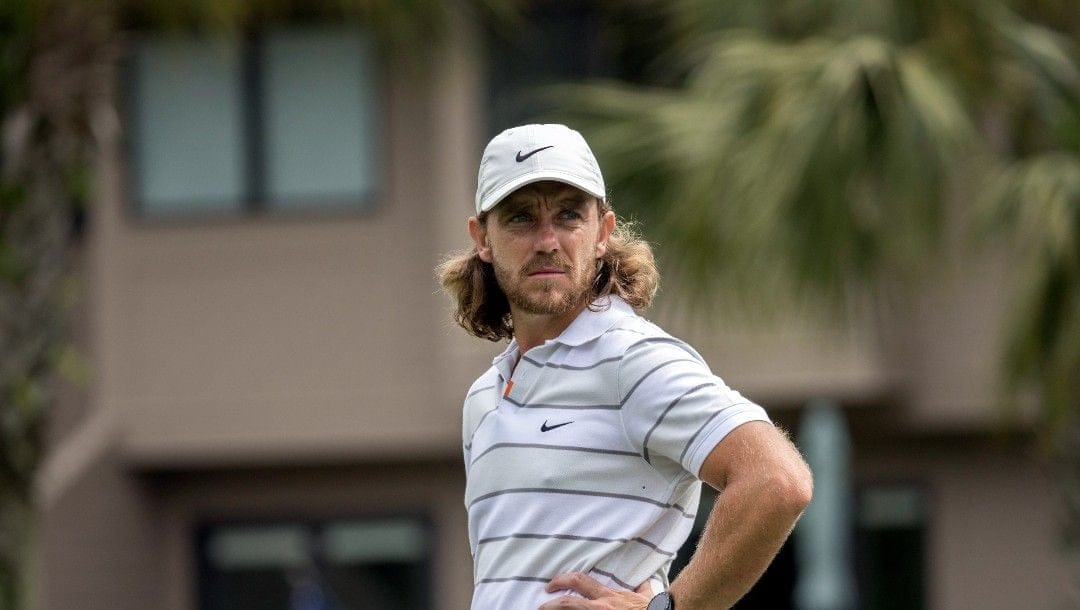 Tommy Fleetwood, of England, waits for his turn to putt on the second green during the second round of the RBC Heritage golf tournament, Friday, April 15, 2022, in Hilton Head Island, S.C.
