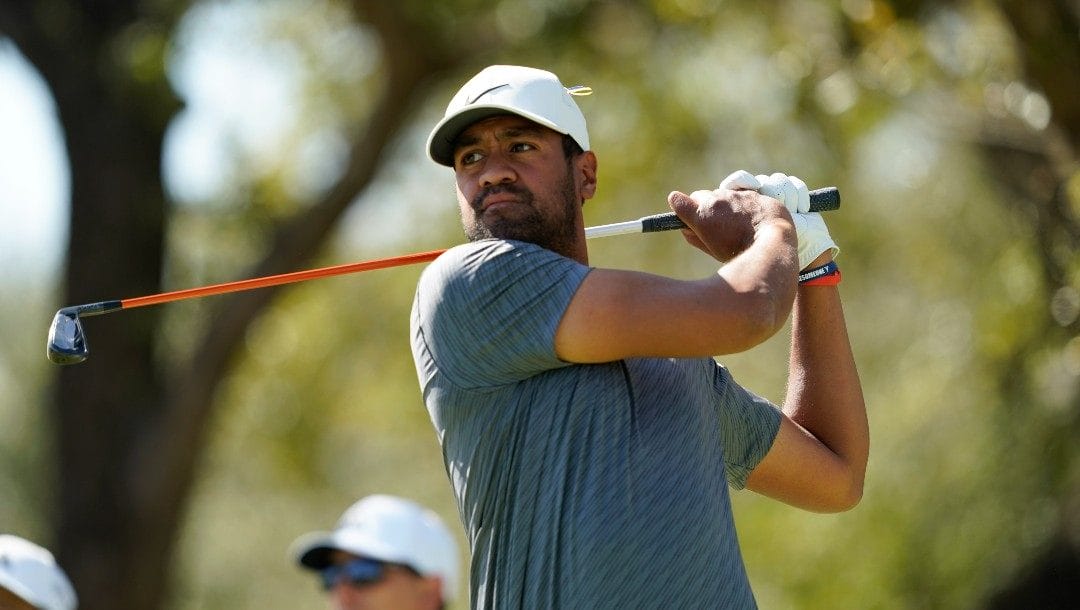 Tony Finau watches his shot from the tenth tee during the third round of the Dell Technologies Match Play Championship golf tournament, Friday, March 25, 2022, in Austin, Texas.