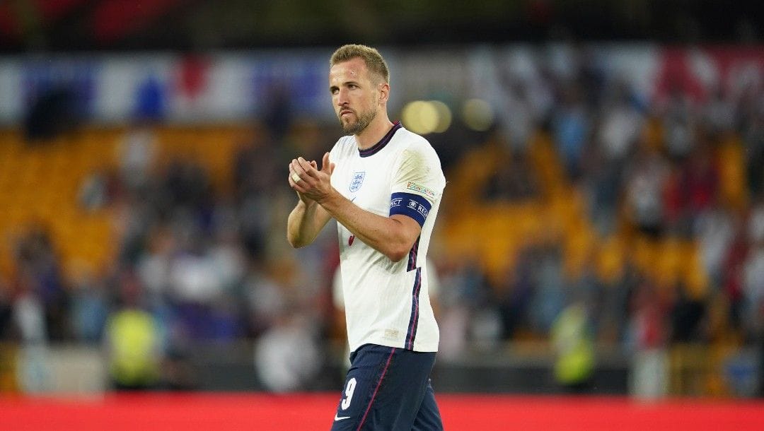England's Harry Kane applauds at the end of the UEFA Nations League soccer match between England and Hungary at the Molineux stadium in Wolverhampton, England, Tuesday, June 14, 2022.