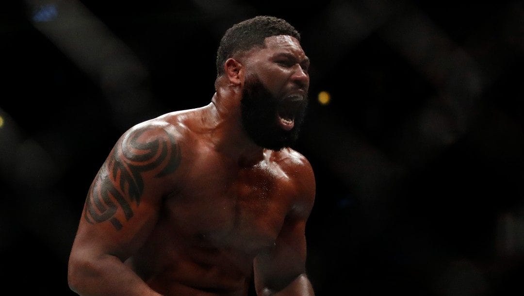 Curtis Blaydes celebrates his win over Alistair Overeem during their heavyweight UFC 225 Mixed Martial Arts bout Saturday, June 9, 2018, in Chicago.