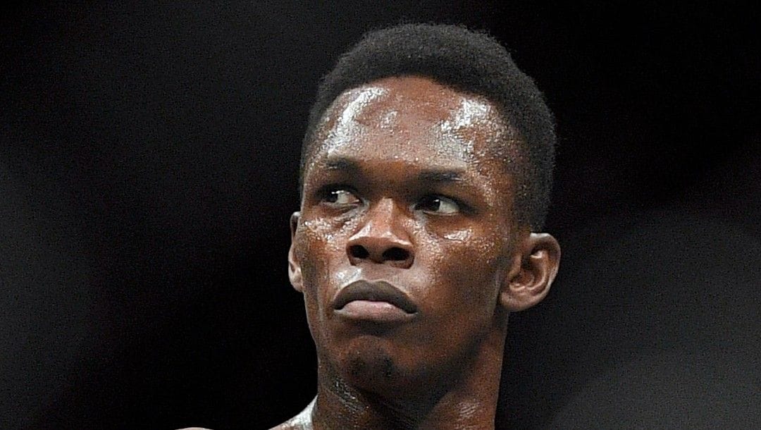 In this Feb. 10, 2019, file photo, Nigeria's Israel Adesanya poses as he fights Brazil's Anderson Silva in their middleweight bout at the UFC 234 mixed martial arts fights in Melbourne, Australia. Adesanya challenges champion Jan Blachowicz of Poland for the light heavyweight title in the main event of UFC 259 on Saturday in Las Vegas.