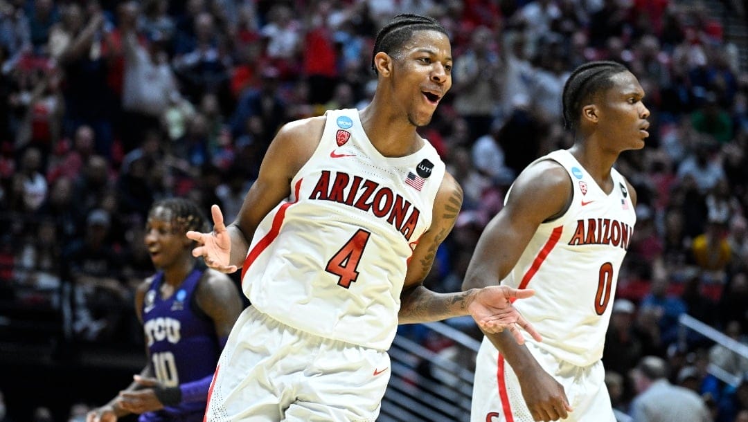 Arizona guard Dalen Terry (4) reacts to a play against TCU during the second half of a second-round NCAA college basketball tournament game, Sunday, March 20, 2022, in San Diego. Arizona won 85-80 in overtime. (AP Photo/Denis Poroy)