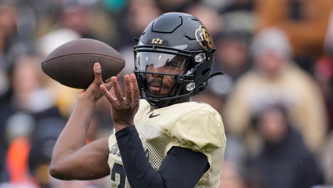 Colorado quarterback Shedeur Sanders (2) in the first half of the team's spring practice NCAA college football game Saturday, April 22, 2023, in Boulder, Colo. (AP Photo/David Zalubowski)