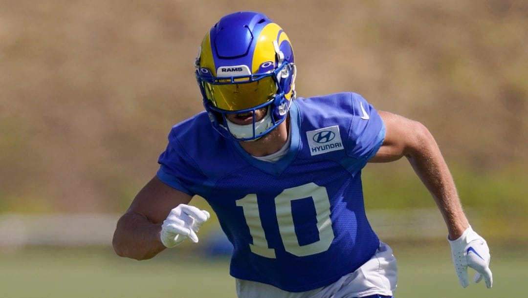 Los Angeles Rams wide receiver Cooper Kupp runs a drill during an NFL mini camp football practice Wednesday, June 8, 2022, in Thousand Oaks, Calif. (AP Photo/Mark J. Terrill)