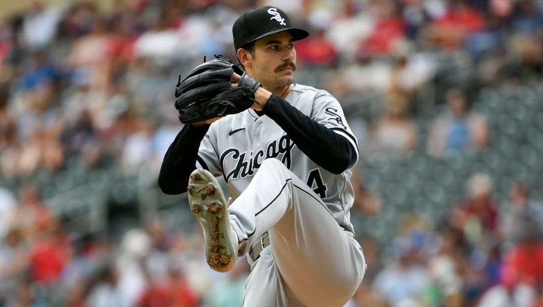 Chicago White Sox pitcher Dylan Cease throws against the Minnesota Twins during the first inning of a baseball game, Sunday, July 17, 2022, in Minneapolis.
