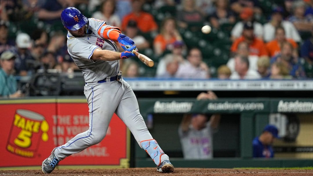 New York Mets' Pete Alonso hits a home run against the Houston Astros during the sixth inning of a baseball game Tuesday, June 21, 2022, in Houston.
